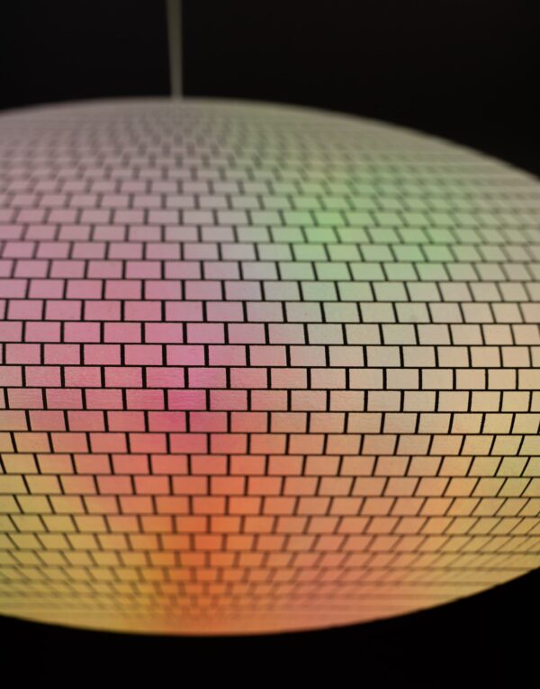 Close up of reflective disco ball print